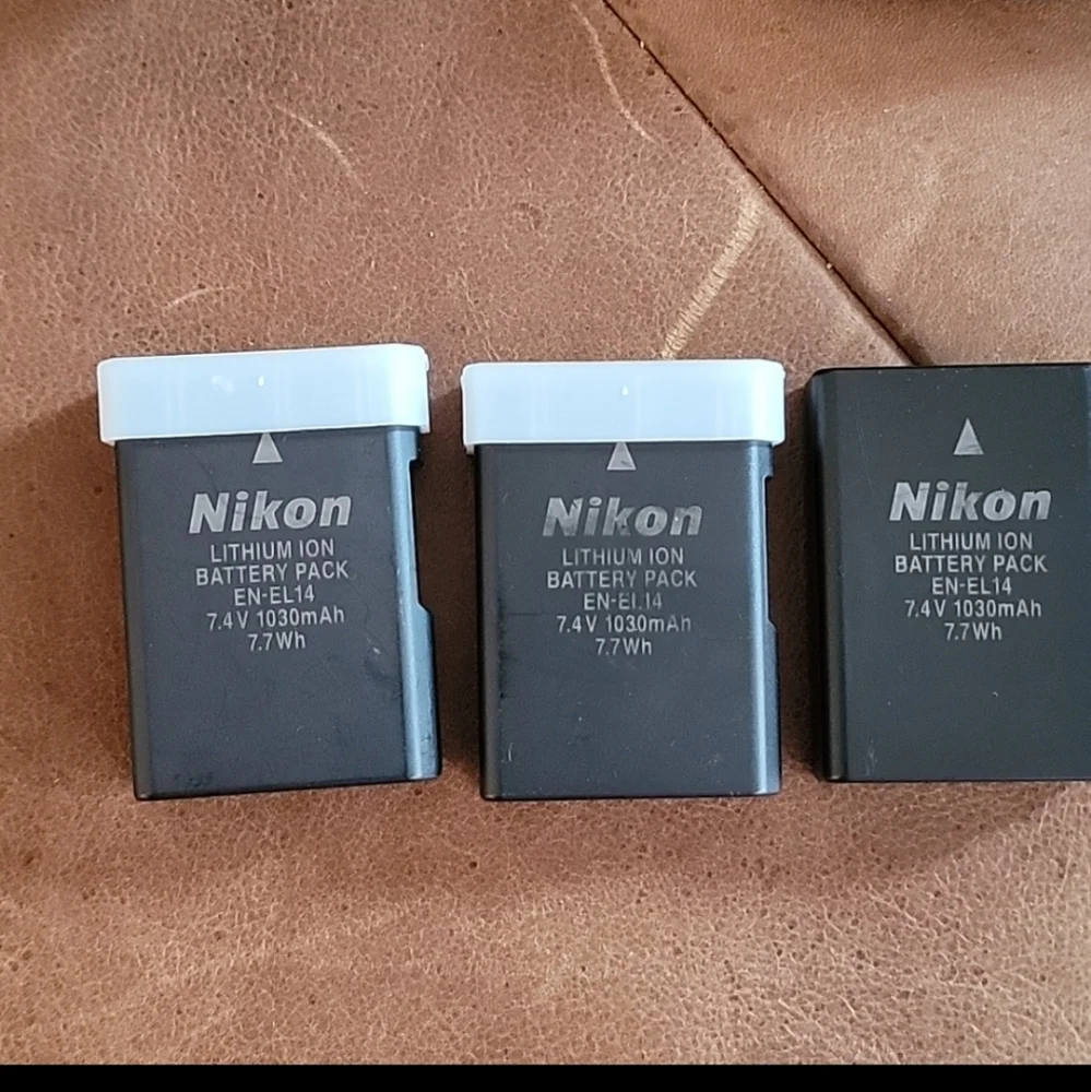 Nikon D3200 camera and 18-55 wide angle lense, and other extras